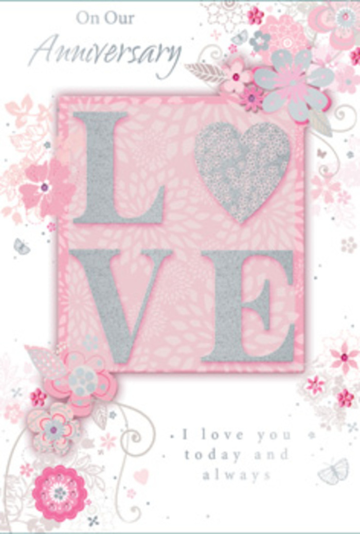 The anniversary card in this image has the gentle radiance of a sunlit room, much like the calm morning light that filters through windows in Blackwall. At its heart, the word LOVE appears in large, confident letters, each one printed in a soft, opalescent tone and finished with a frosted glitter accent. These raised letters offer a subtle, tactile ridge to the touch, and the glitter catches even the faintest light, sparkling delicately rather than glaring. The letters sit against a panel of warm blush pink, the tone rich enough to provide contrast yet still romantic and gentle.

Around this central motif, wispy, hand-drawn blooms and airy sprays of foliage drift along the edges and corners, like a florist's freehand plan for a cascading bouquet. The flowers are rendered in shades of blush, pearl, and soft dove grey, some with petals that appear almost translucent, others shaded more deeply to suggest layered petals. Fine filigree lines, slender leaves, and almost-hidden butterflies weave between the flowers, evoking the flutter of hearts and the quiet joy of an anniversary evening spent strolling near the Thames Path. The composition feels both spacious and detailed, allowing the eye to wander from one delicate element to another without feeling crowded.

Below and around the main design, a graceful script carries a message along the lines of I love you today and always, set in understated lettering that feels deeply personal rather than showy. The background is a gentle pastel pink, smooth and even, like high-quality card stock chosen for a significant occasion. As a local Blackwall florist might describe a hand-tied bouquet as a gesture of enduring affection, this card translates that feeling into paper: soft, romantic, and quietly filled with gratitude for years shared together.